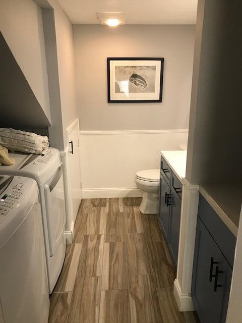 825 Center Street, Unit 1B Jupiter, FL 33458 - Photo 7 of 16 a bathroom with a sink and a toilet