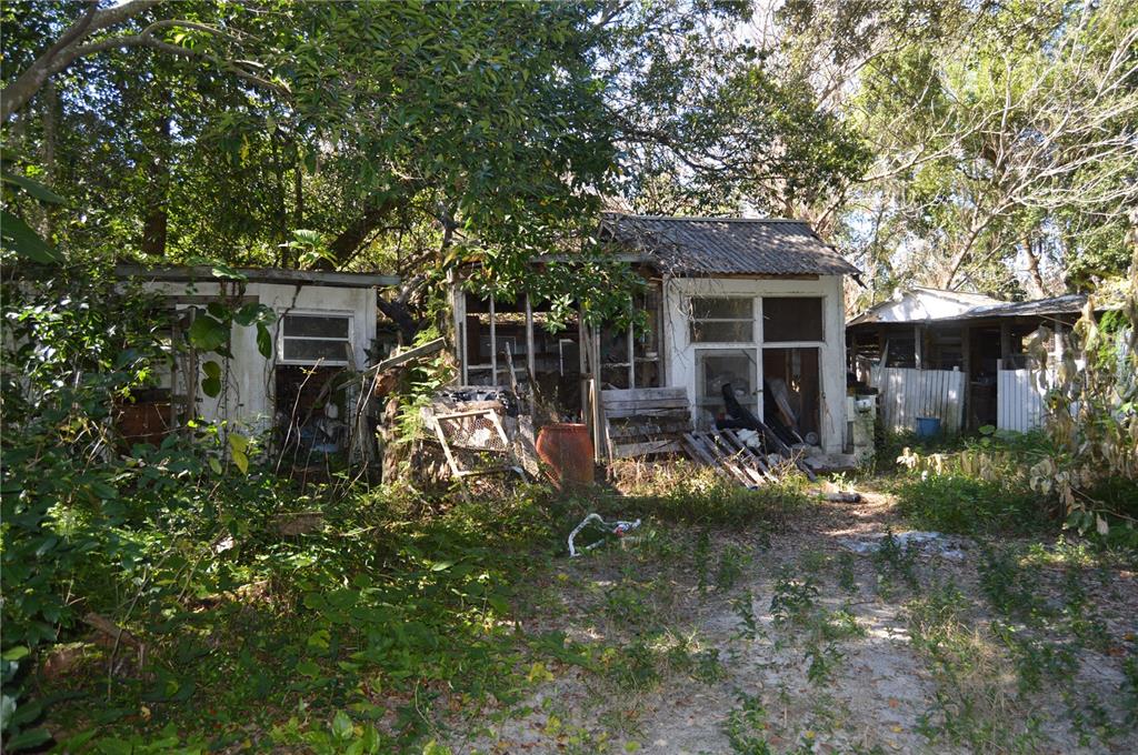 18117 Branch Road Hudson, FL 34667 - Photo 13 of 22 front view of house with a yard