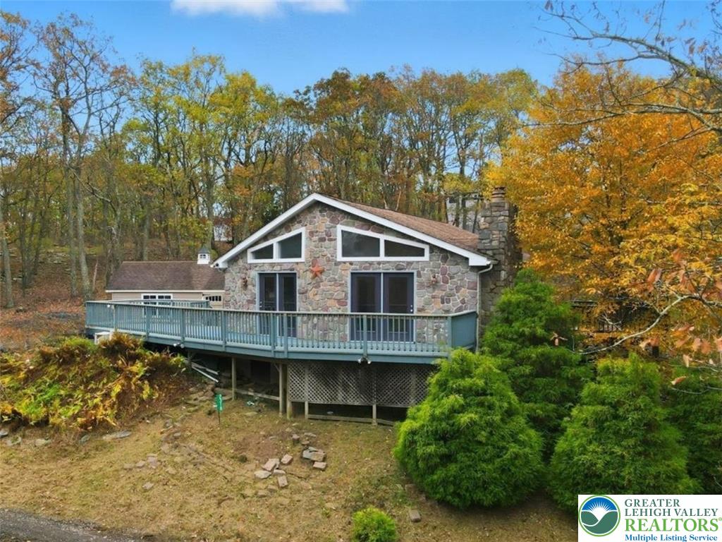 2318 Sunbird Court Scotrun, PA 18355 - Photo 11 of 56 a house with trees in the background