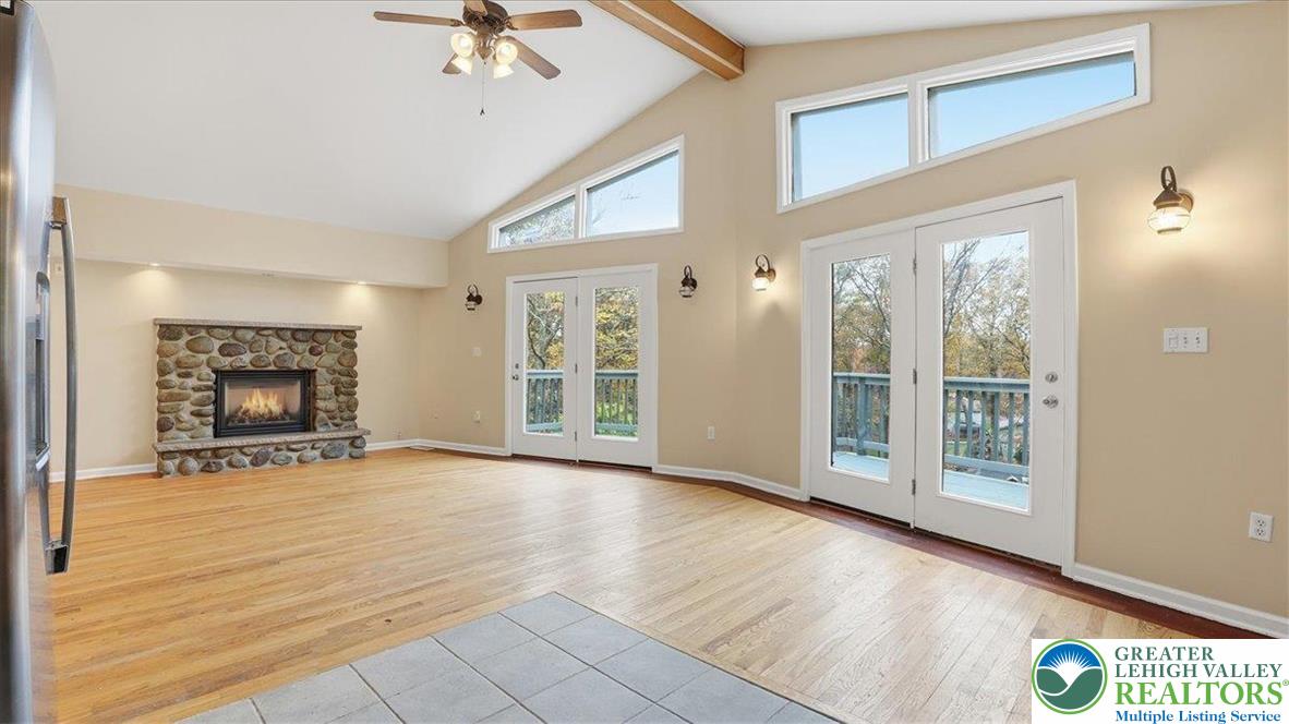 2318 Sunbird Court Scotrun, PA 18355 - Photo 19 of 56 a view of an empty room with a fireplace and a window