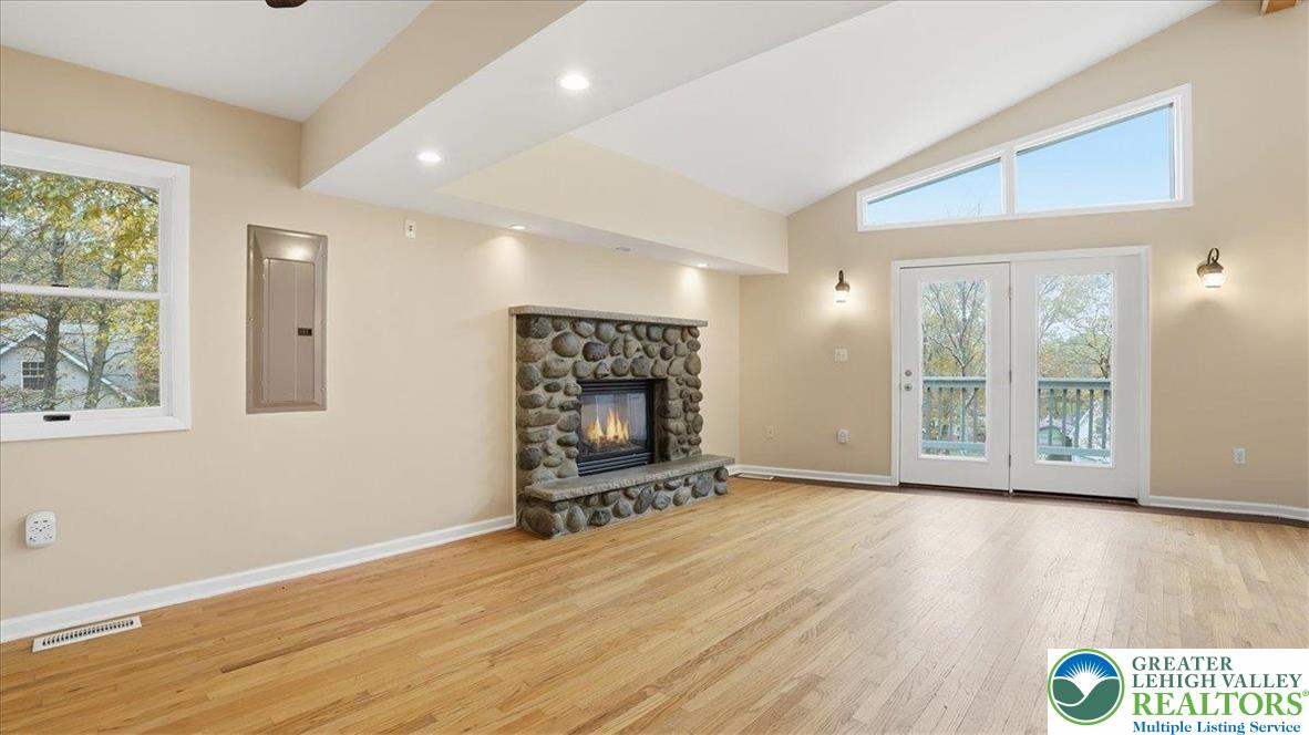 2318 Sunbird Court Scotrun, PA 18355 - Photo 21 of 56 a view of an empty room with wooden floor and a window