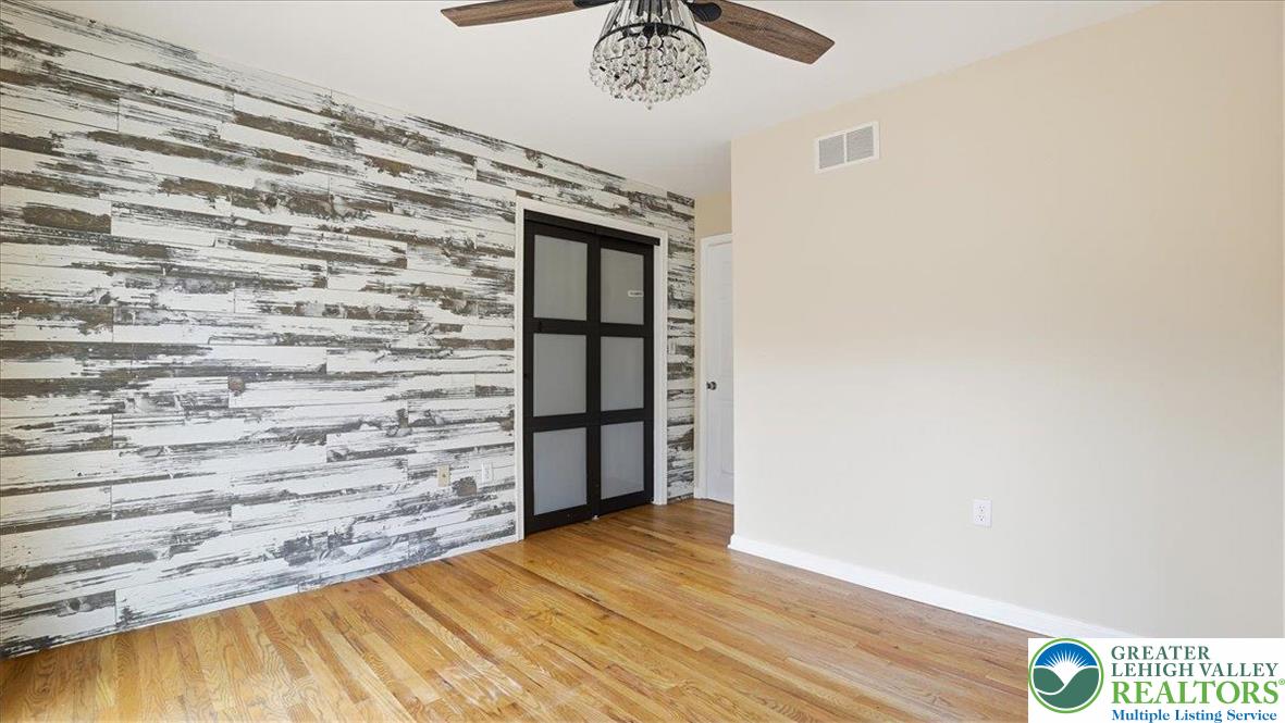 2318 Sunbird Court Scotrun, PA 18355 - Photo 27 of 56 a view of entryway with wooden floor