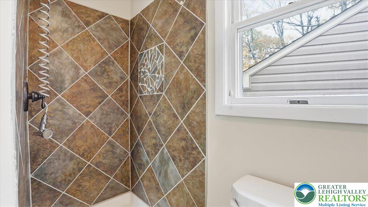 2318 Sunbird Court Scotrun, PA 18355 - Photo 29 of 56 a bathroom with a toilet and a shower