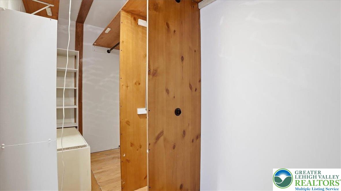 2318 Sunbird Court Scotrun, PA 18355 - Photo 32 of 56 a bathroom with a shower and a door