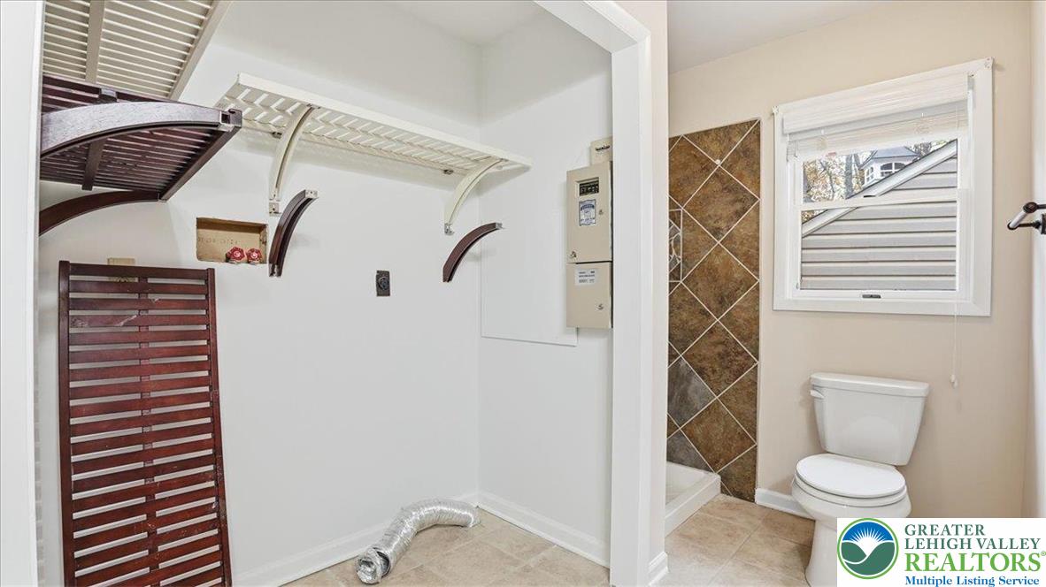 2318 Sunbird Court Scotrun, PA 18355 - Photo 33 of 56 a bathroom with a toilet and a shower