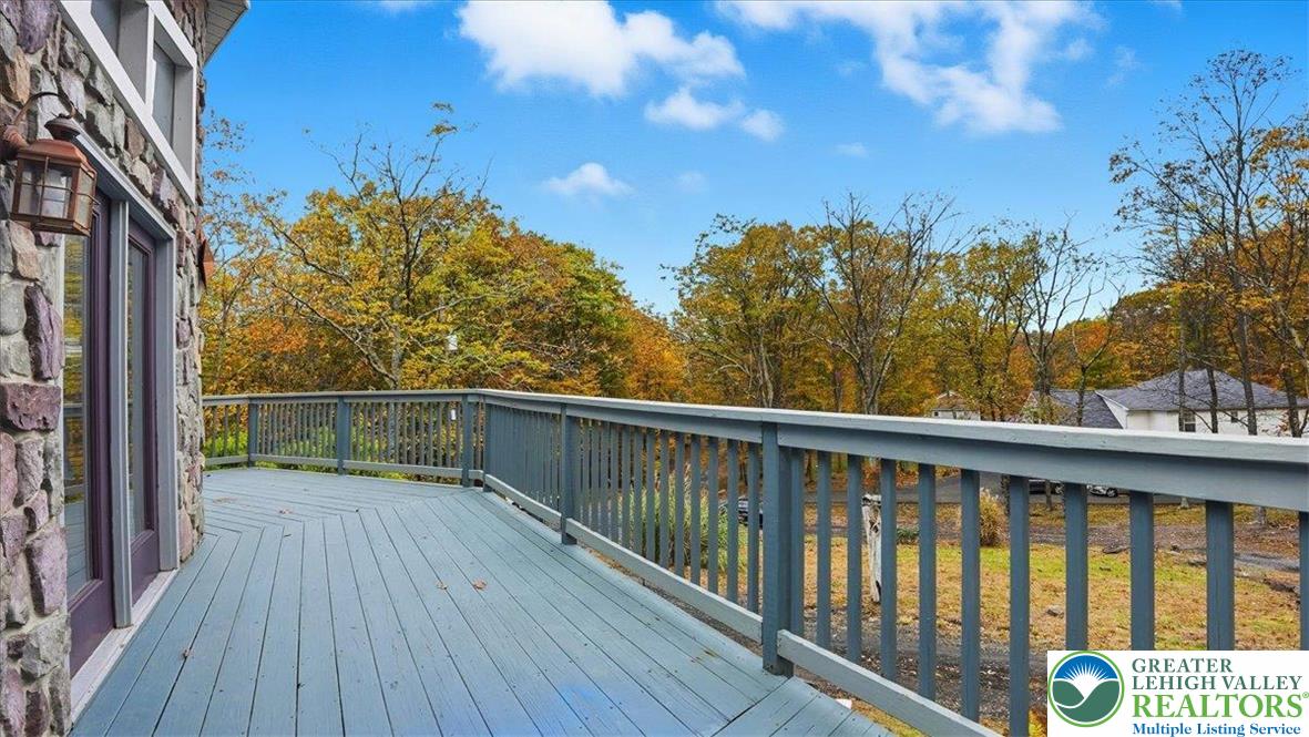 2318 Sunbird Court Scotrun, PA 18355 - Photo 38 of 56 a view of a balcony with wooden fence