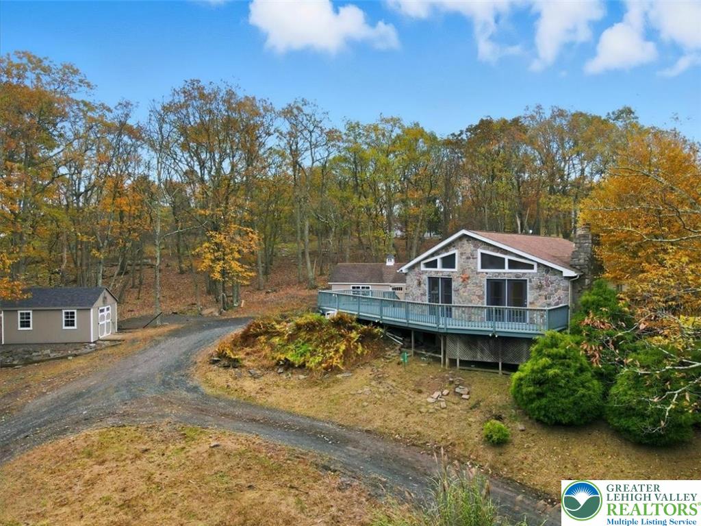 2318 Sunbird Court Scotrun, PA 18355 - Photo 7 of 56 a front view of a house with a yard