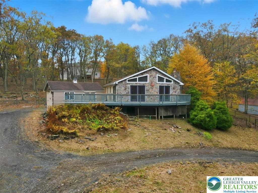 2318 Sunbird Court Scotrun, PA 18355 - Photo 10 of 56 a front view of a house with a yard