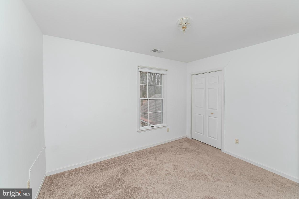 15710 Yeoho Road Sparks, MD 21152 - Photo 16 of 30 a view of an empty room with a window