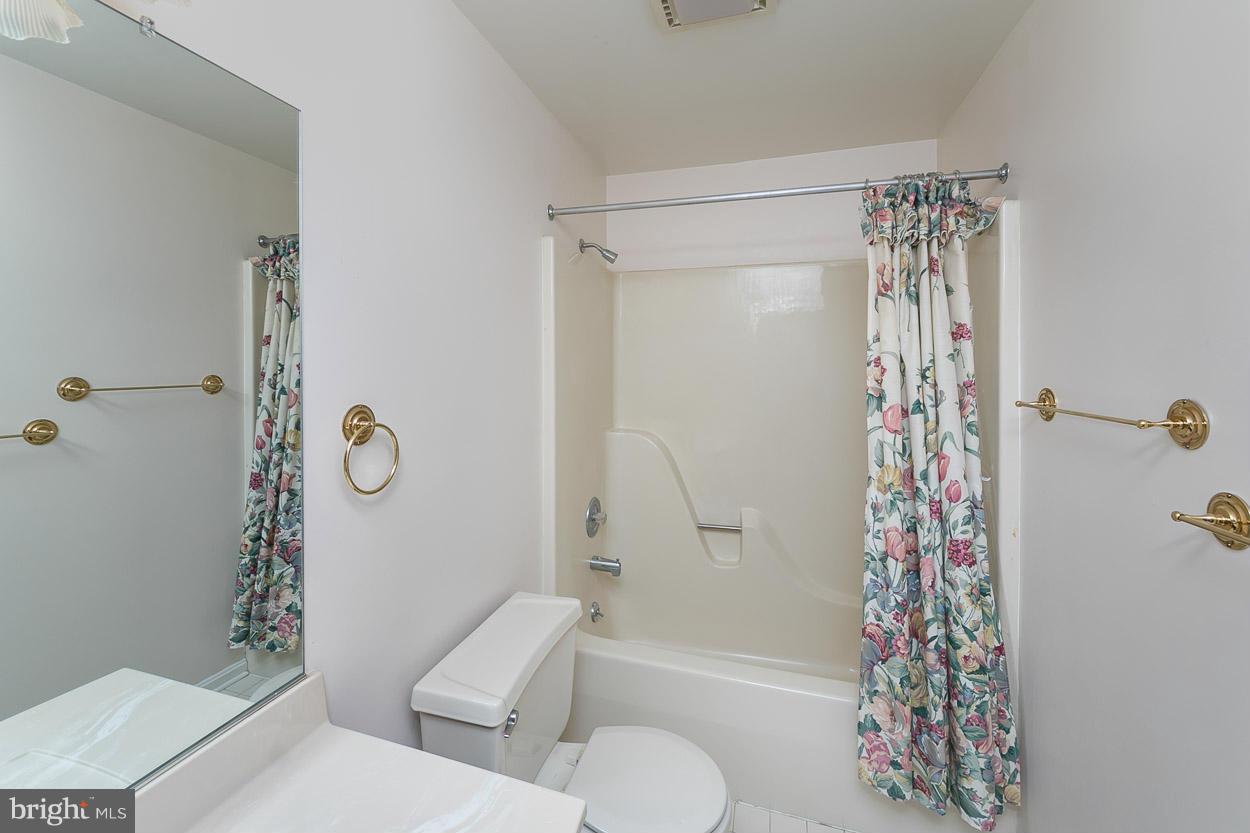 15710 Yeoho Road Sparks, MD 21152 - Photo 26 of 30 a bathroom with a shower a toilet and a shower