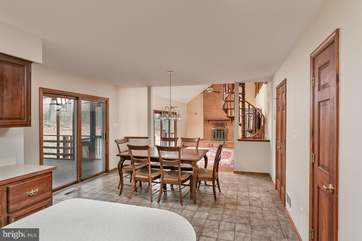 15710 Yeoho Road Sparks, MD 21152 - Photo 10 of 30 a view of a dining room with furniture window and outside view