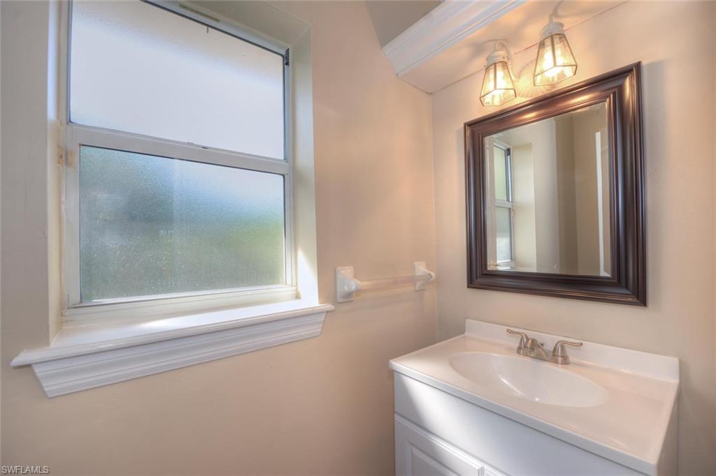 18185 Useppa Road Fort Myers, FL 33967 - Photo 8 of 22 Half bath on second floor