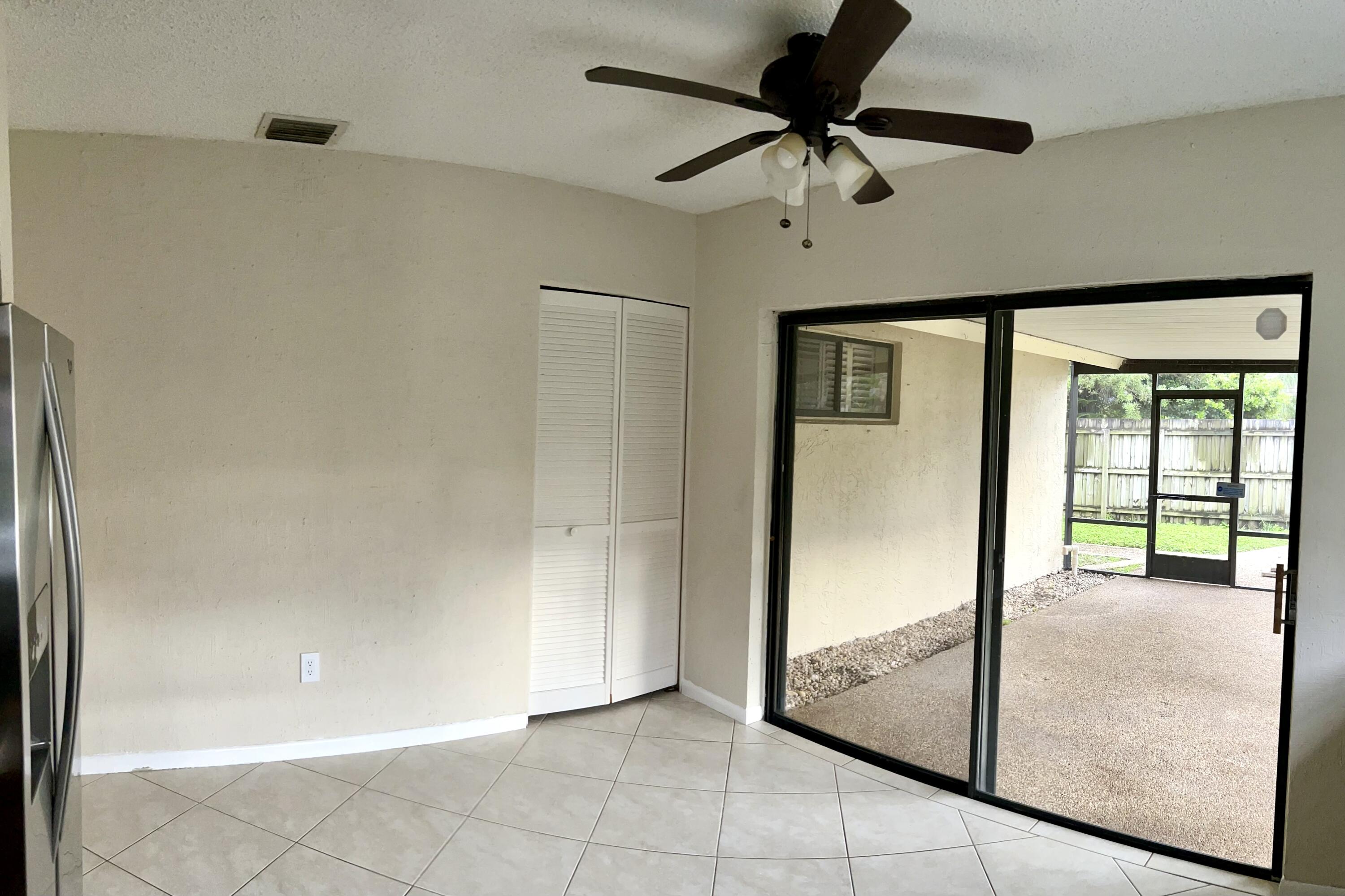 7614 Sierra Terrace West Boca Raton, FL 33433 - Photo 15 of 20 a view of an empty room and window