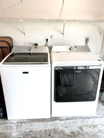 a view of sink and microwave