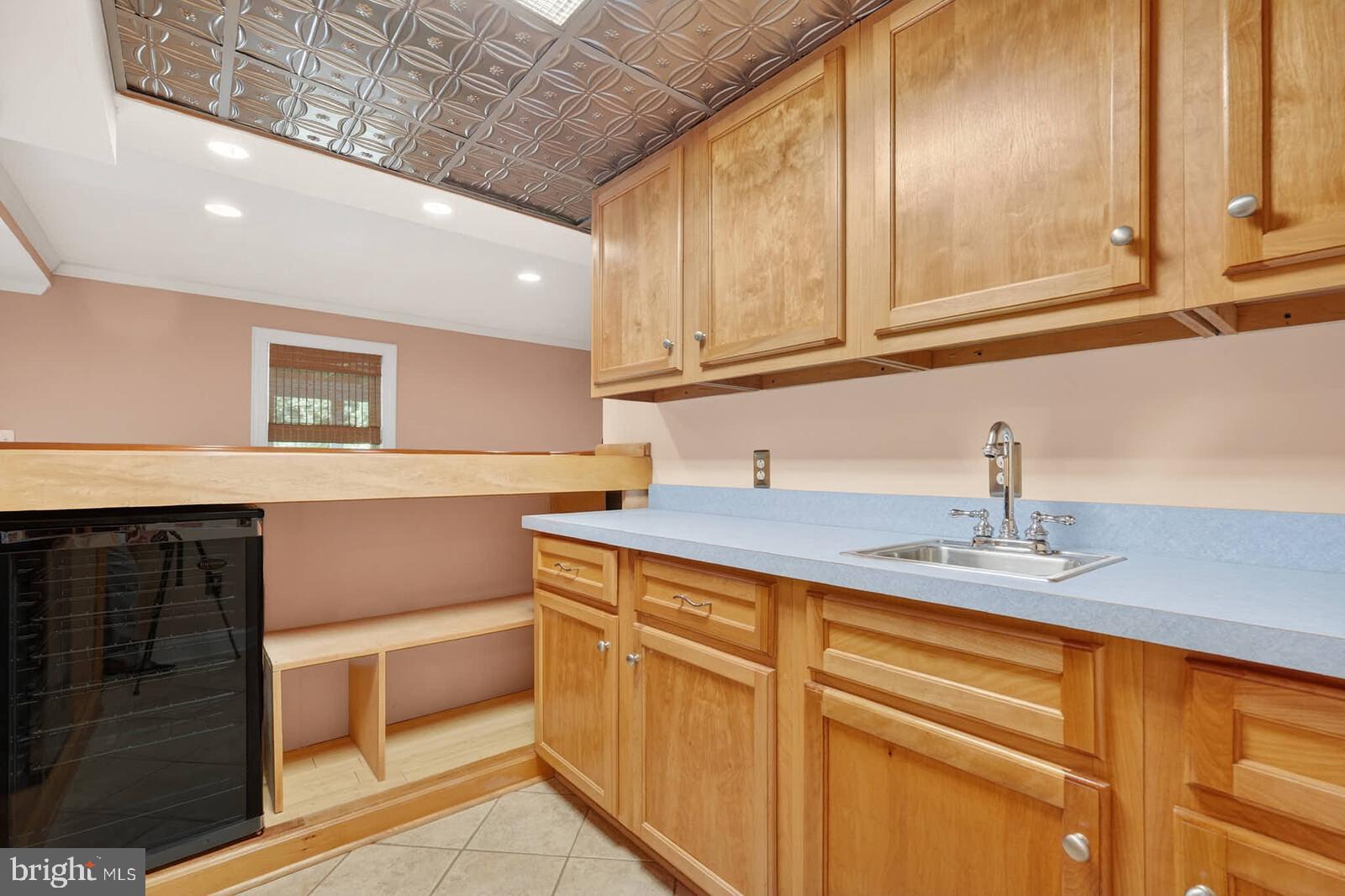 2108 Merrifields Drive Silver Spring, MD 20906 - Photo 47 of 69 a kitchen with a sink and cabinets