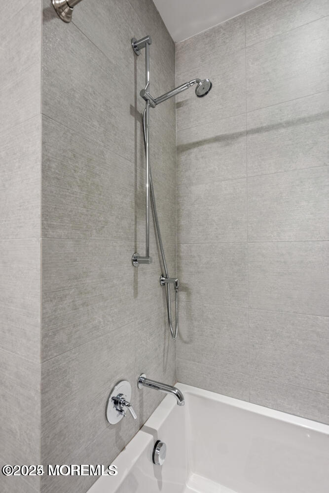 15 Morris Avenue, Unit 308 Long Branch, NJ 07740 - Photo 15 of 48 a bathroom with a shower