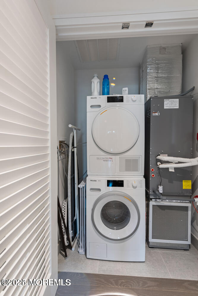 15 Morris Avenue, Unit 308 Long Branch, NJ 07740 - Photo 16 of 48 a utility room with dryer and washer