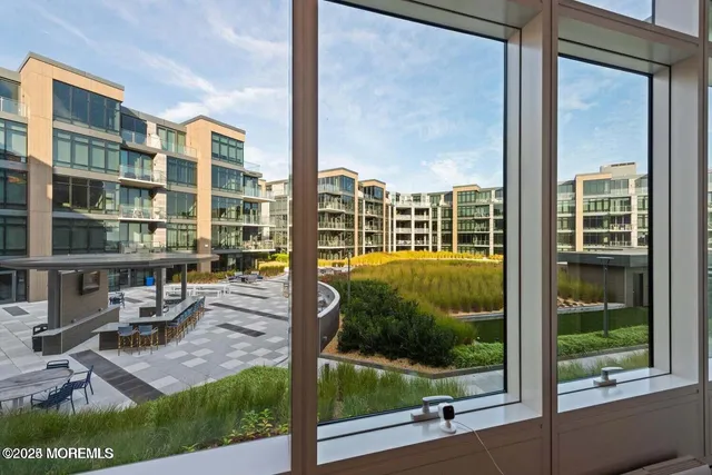 a view of balcony with furniture