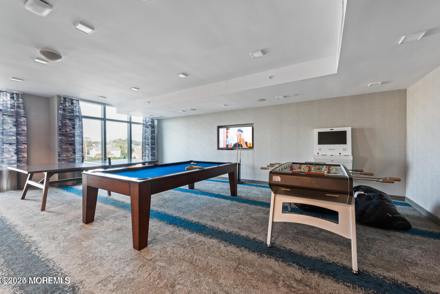 15 Morris Avenue, Unit 308 Long Branch, NJ 07740 - Photo 32 of 48 a room with furniture pool table and windows
