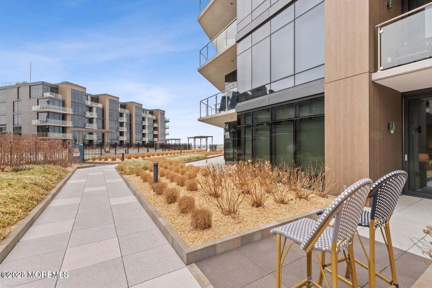 15 Morris Avenue, Unit 308 Long Branch, NJ 07740 - Photo 39 of 48 a view of roof with building