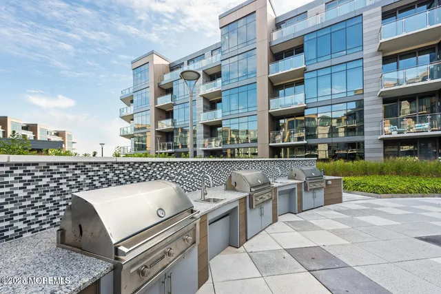 a view of balcony with furniture