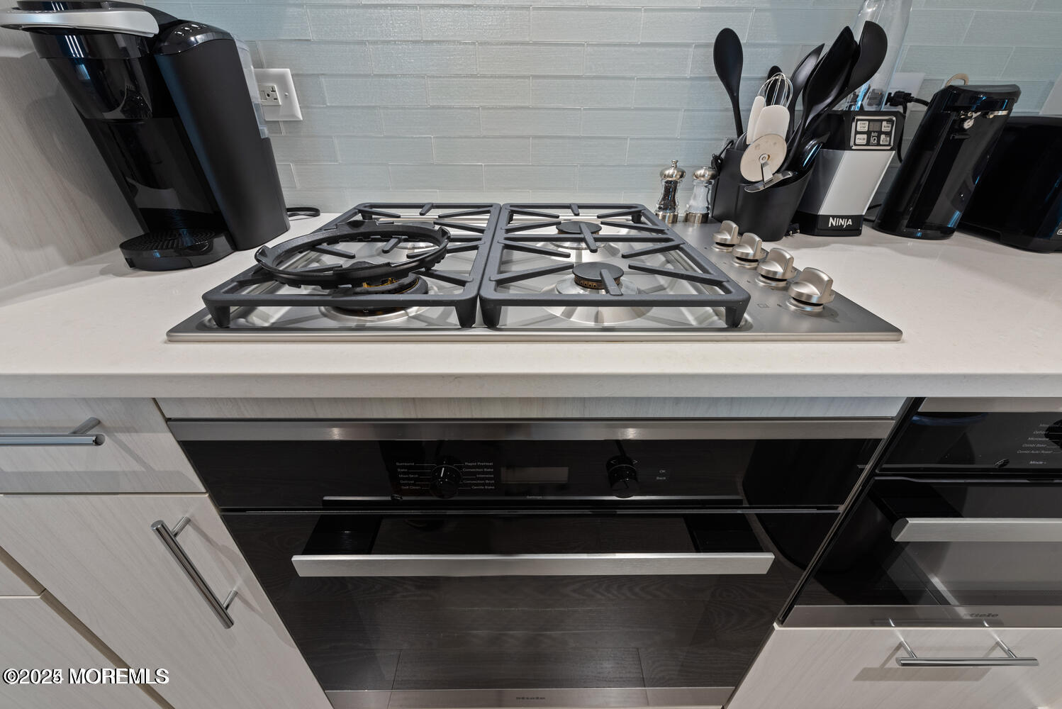 15 Morris Avenue, Unit 308 Long Branch, NJ 07740 - Photo 6 of 48 a close view of a stove top oven sitting on a counter