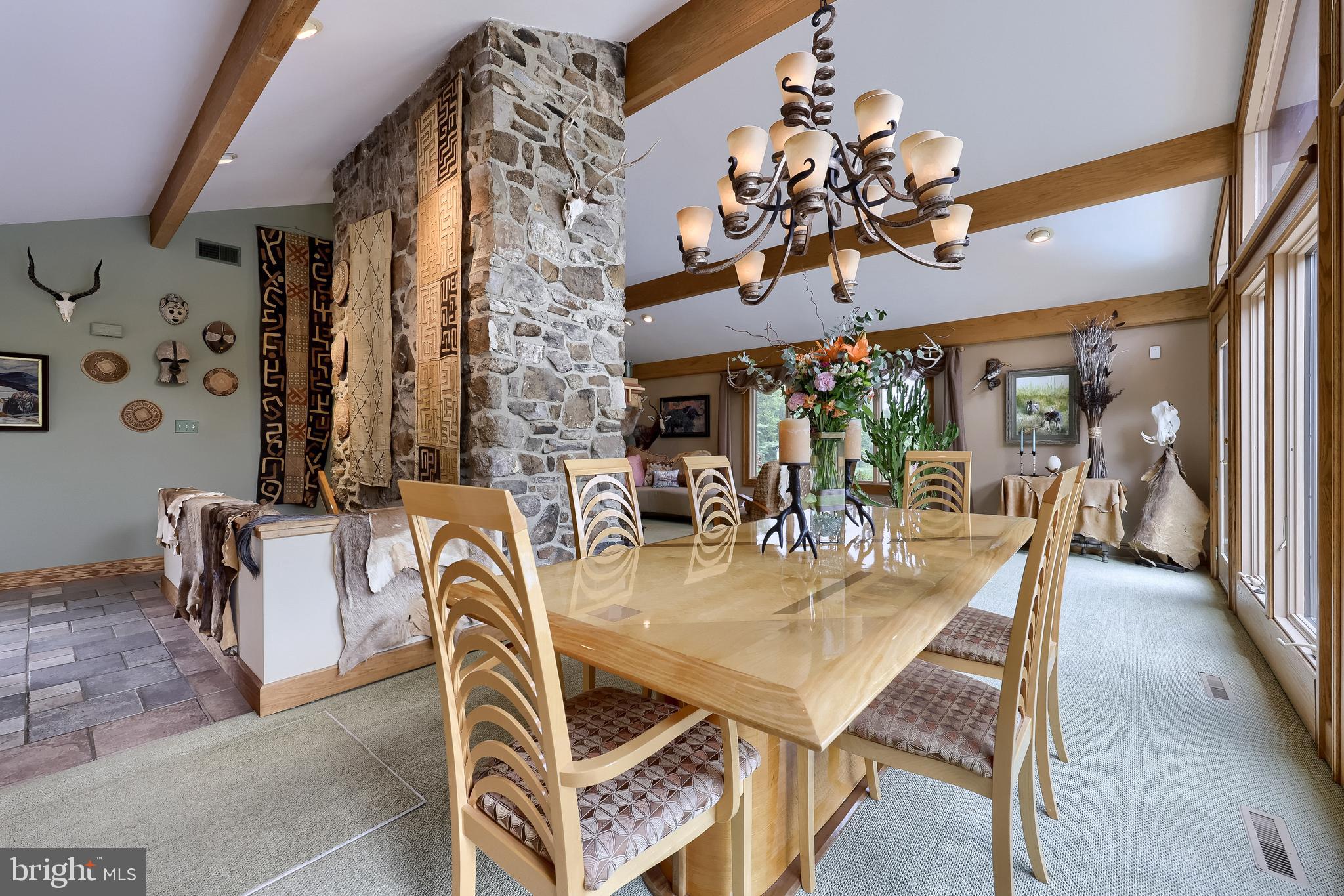 5776 Pheasant Run Road Hellam, PA 17406 - Photo 11 of 56 a view of a dining room with furniture and chandelier