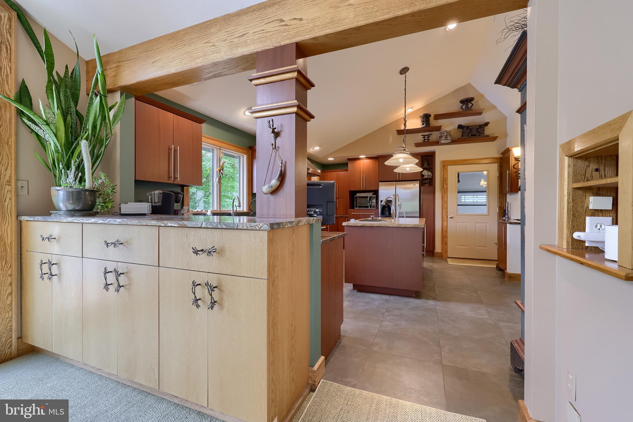5776 Pheasant Run Road Hellam, PA 17406 - Photo 12 of 56 a kitchen with cabinets and window