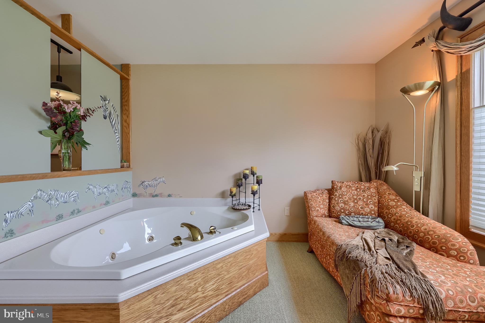 5776 Pheasant Run Road Hellam, PA 17406 - Photo 20 of 56 a bedroom with a bed and a couch