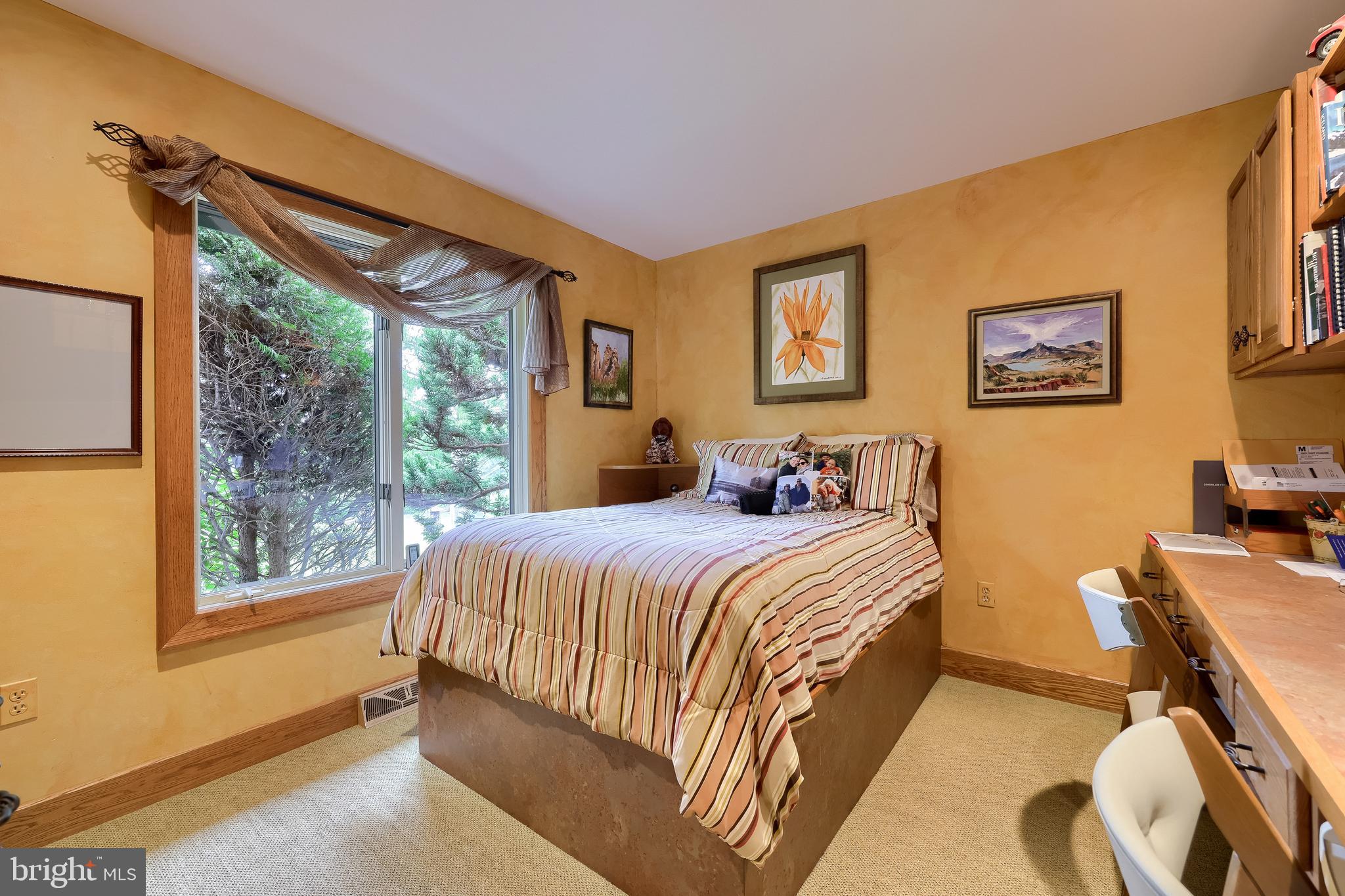 5776 Pheasant Run Road Hellam, PA 17406 - Photo 25 of 56 a bedroom with a bed and a large window