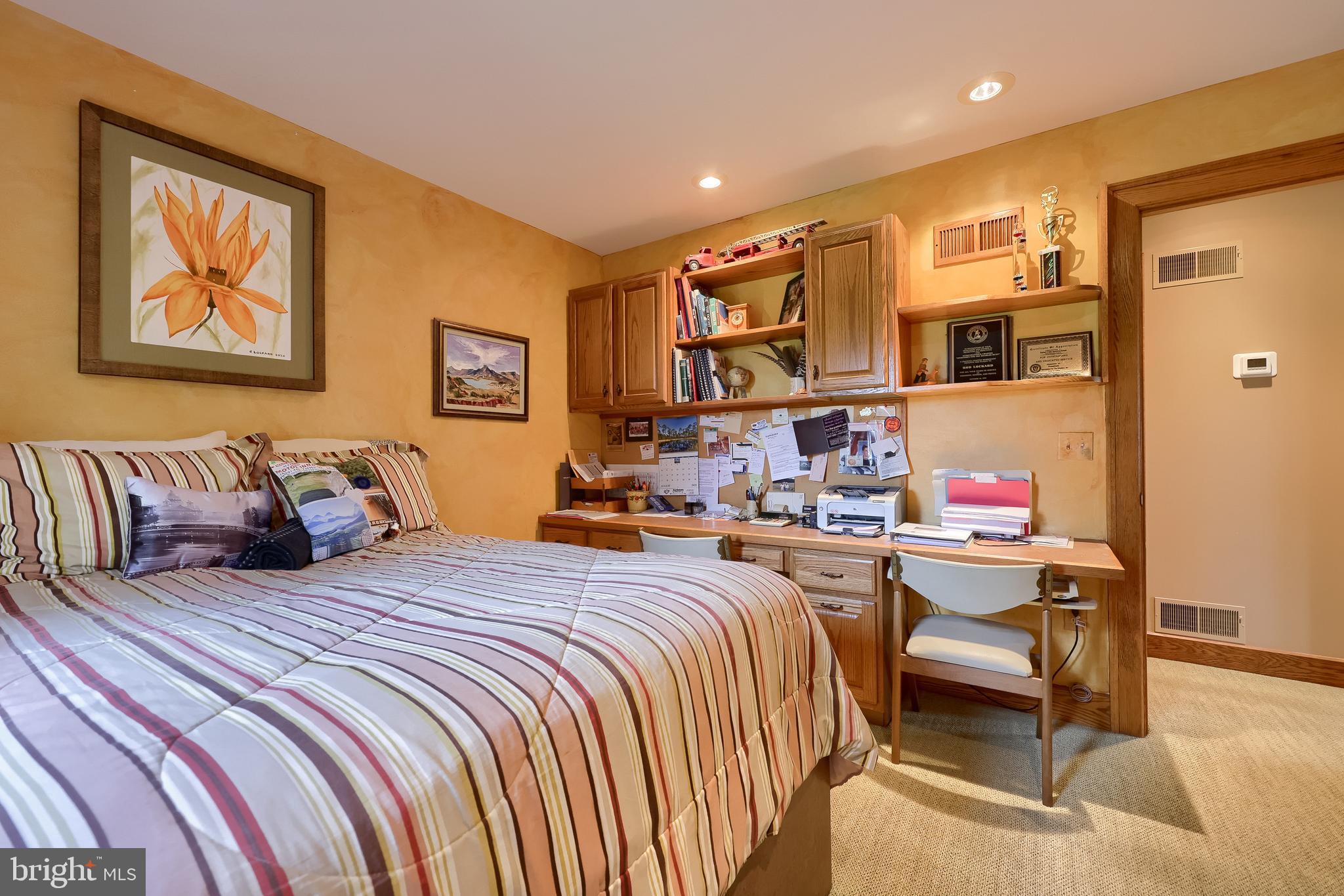 5776 Pheasant Run Road Hellam, PA 17406 - Photo 26 of 56 a bed room with a bed and furniture