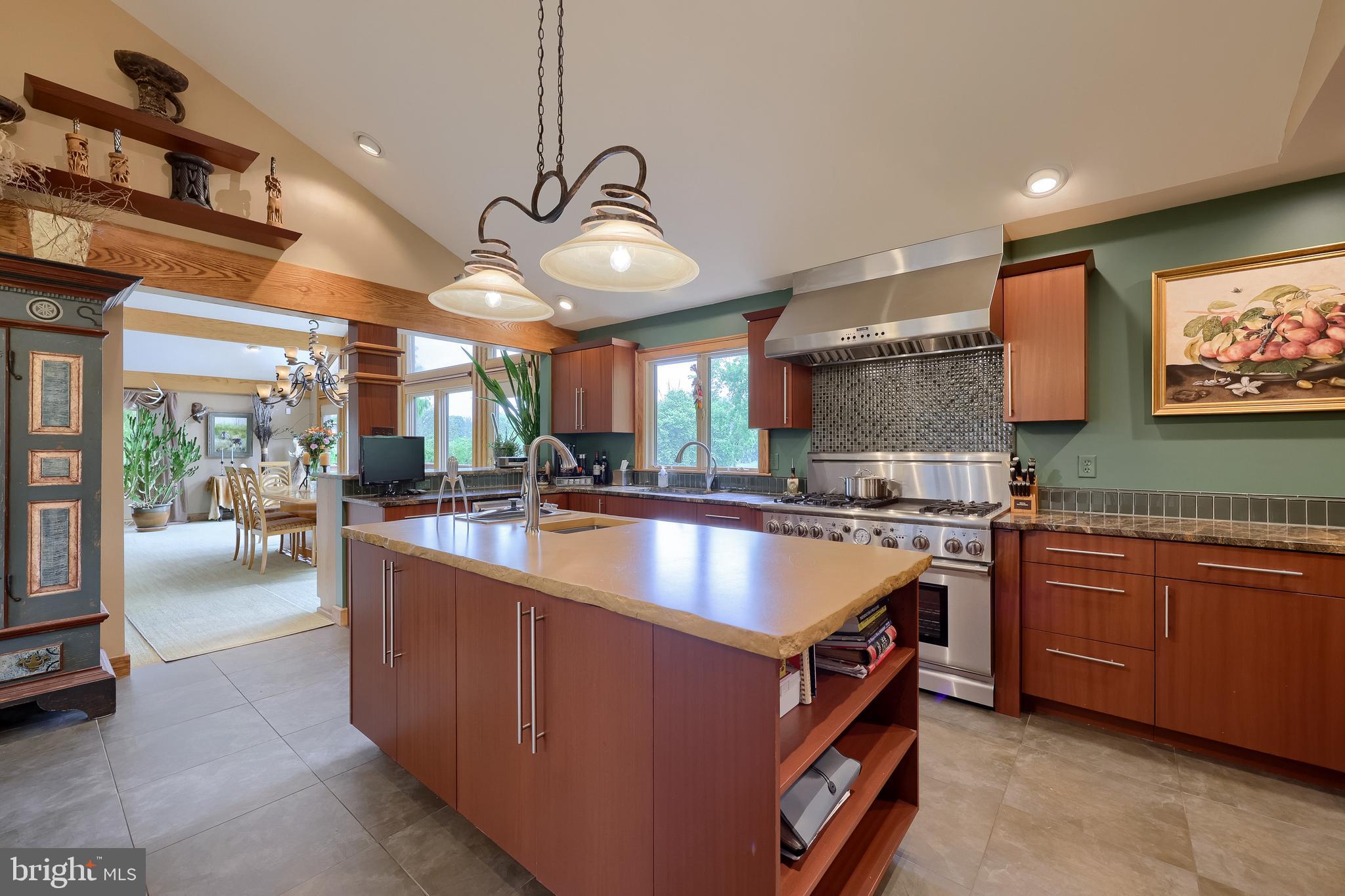 5776 Pheasant Run Road Hellam, PA 17406 - Photo 3 of 56 a large kitchen with stainless steel appliances granite countertop a sink and cabinets