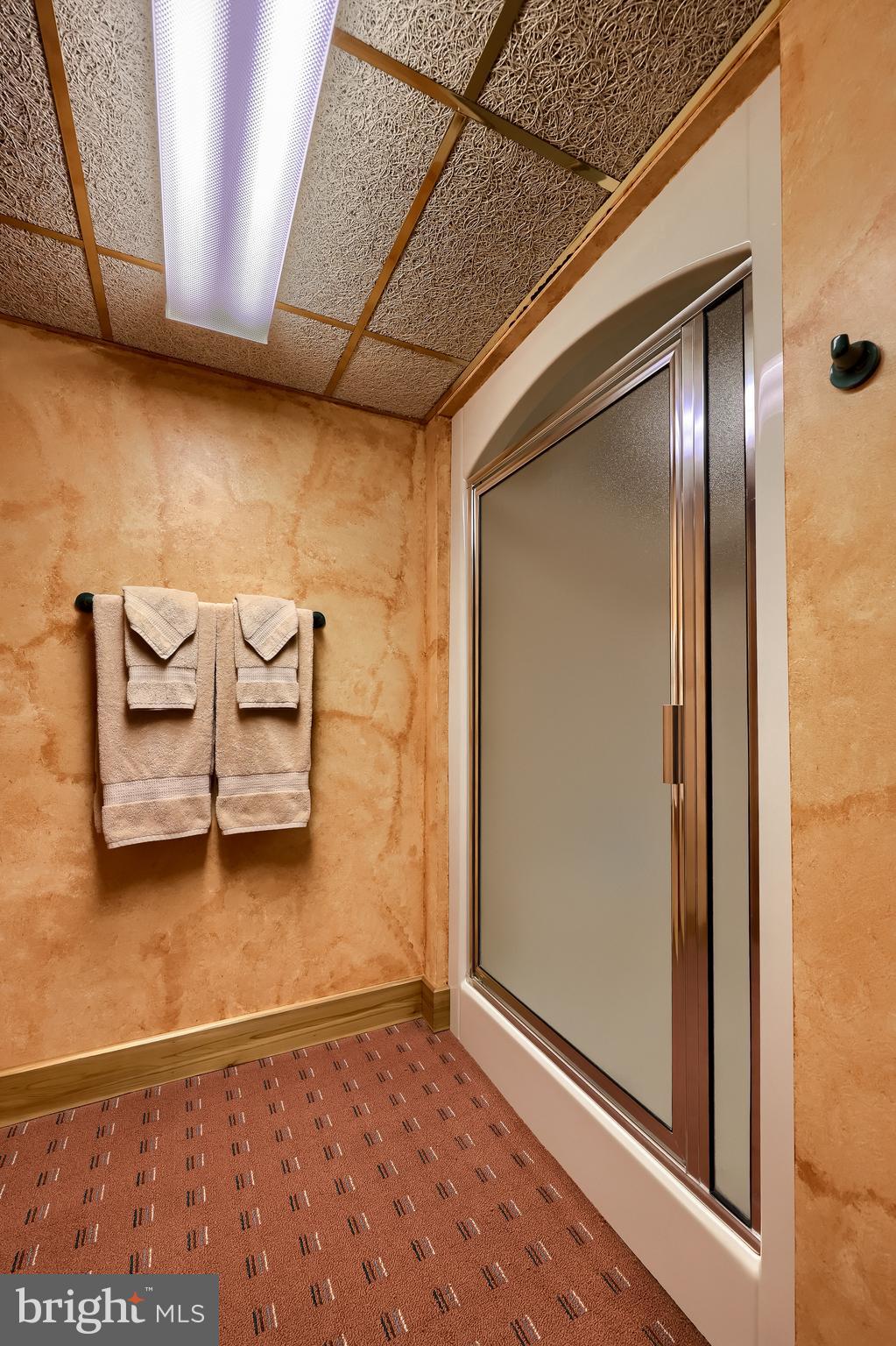 5776 Pheasant Run Road Hellam, PA 17406 - Photo 38 of 56 a view of an empty room with wooden floor and a window