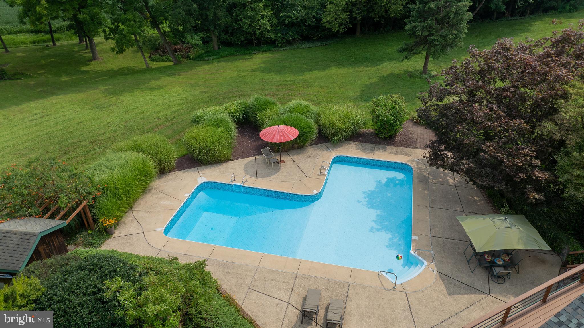 5776 Pheasant Run Road Hellam, PA 17406 - Photo 4 of 56 a view of a yard with chairs