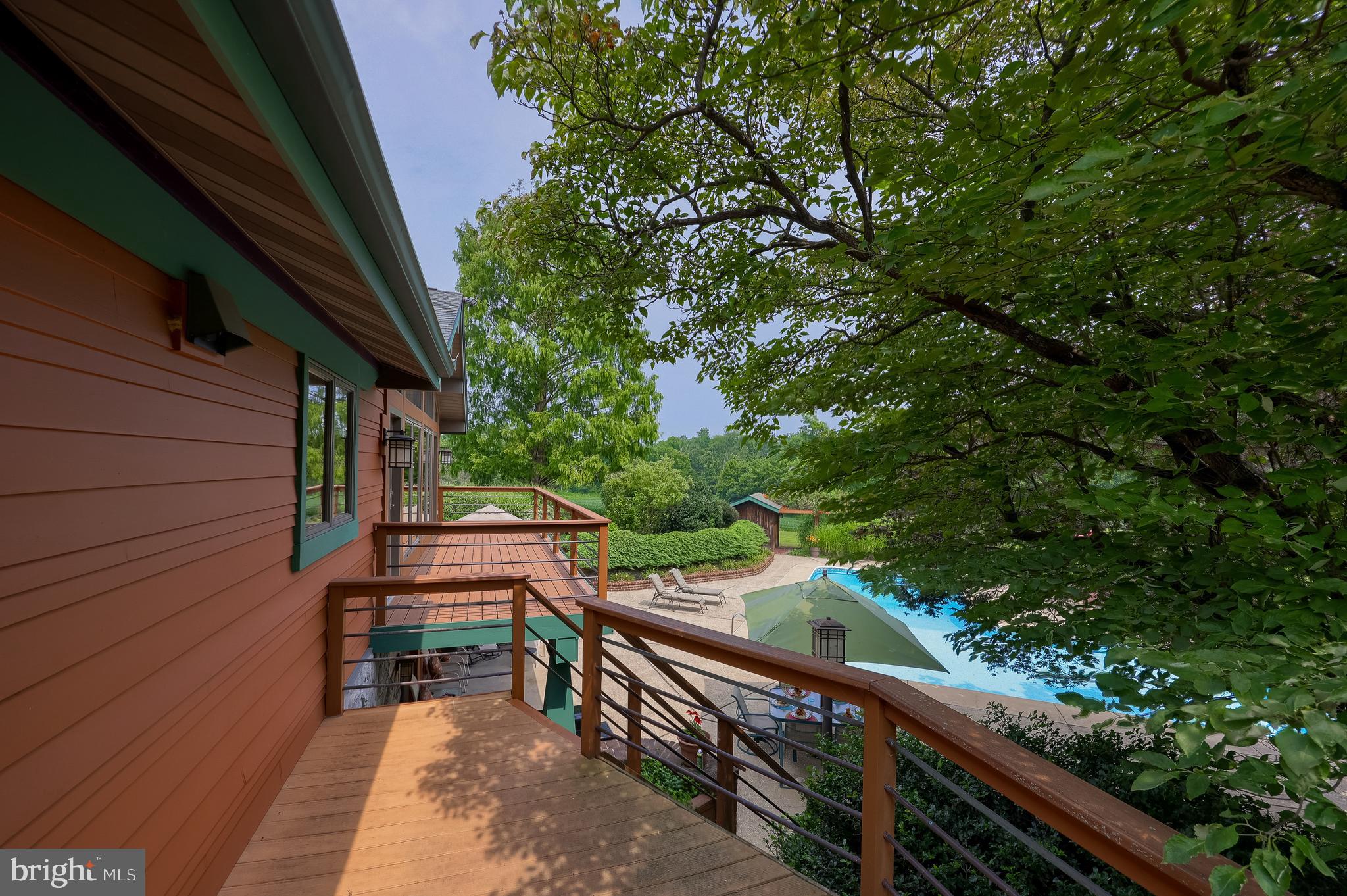 5776 Pheasant Run Road Hellam, PA 17406 - Photo 43 of 56 a balcony with wooden floor and outdoor seating