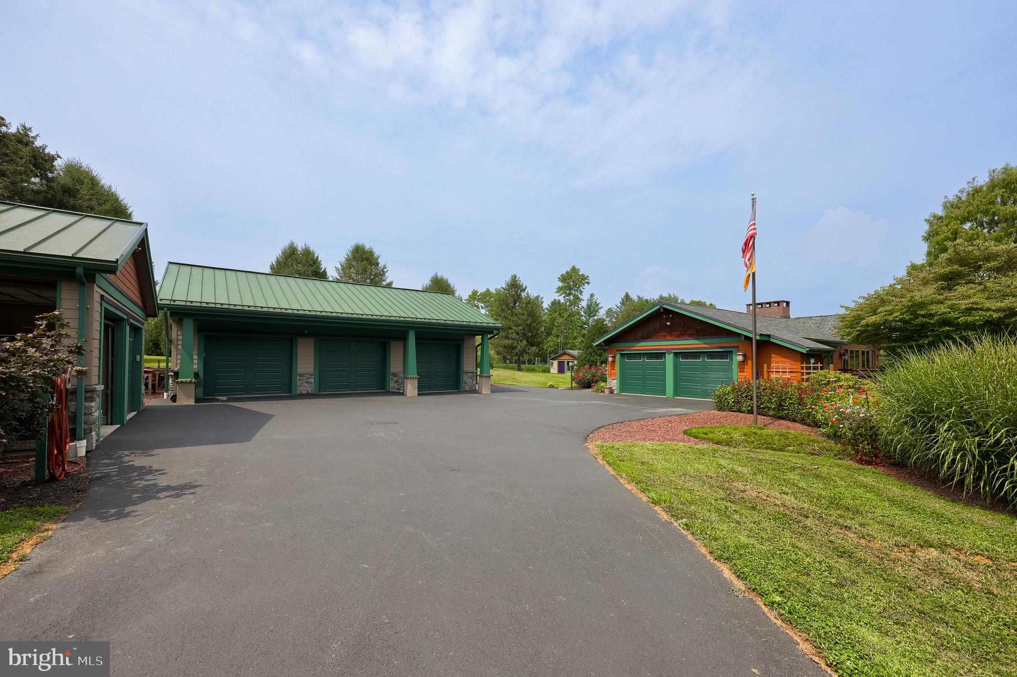 5776 Pheasant Run Road Hellam, PA 17406 - Photo 45 of 56 a view of a house with a yard and potted plants