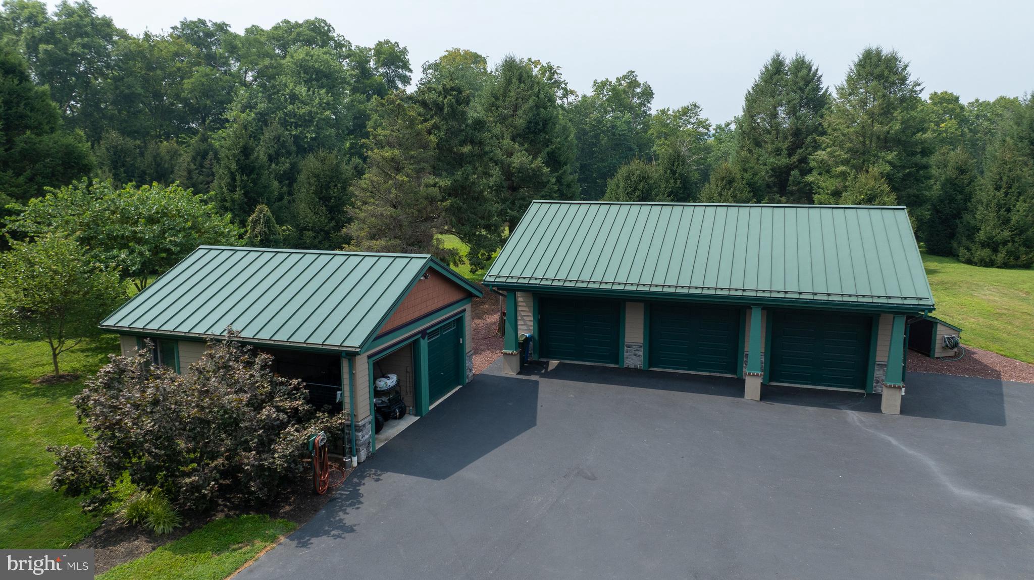 5776 Pheasant Run Road Hellam, PA 17406 - Photo 46 of 56 a view of a house with a yard and outdoor seating