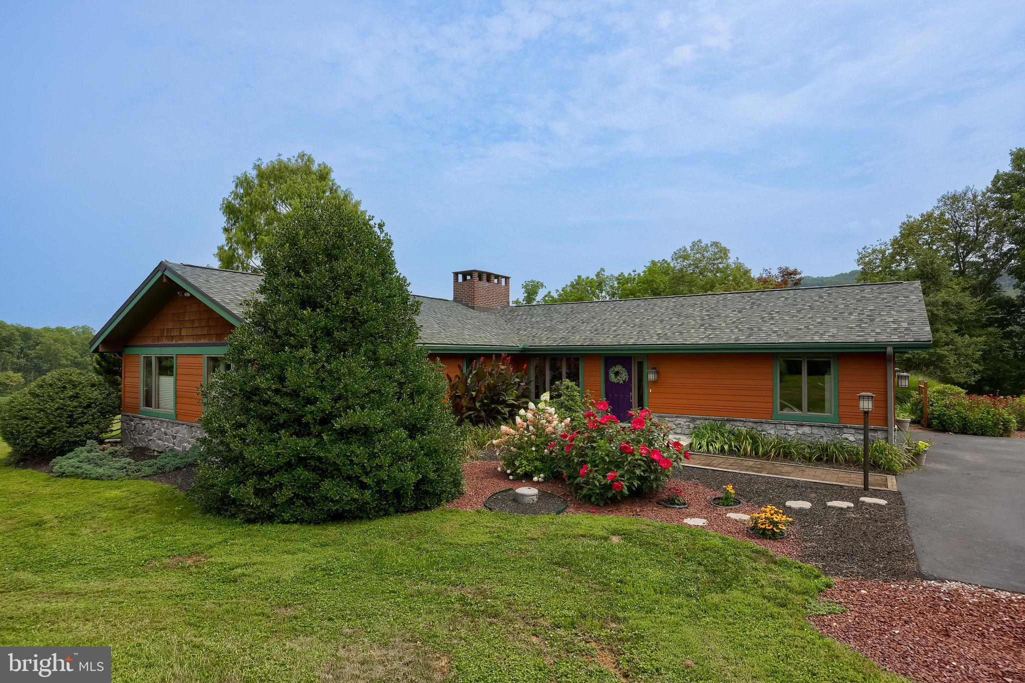 5776 Pheasant Run Road Hellam, PA 17406 - Photo 5 of 56 a front view of a house with garden