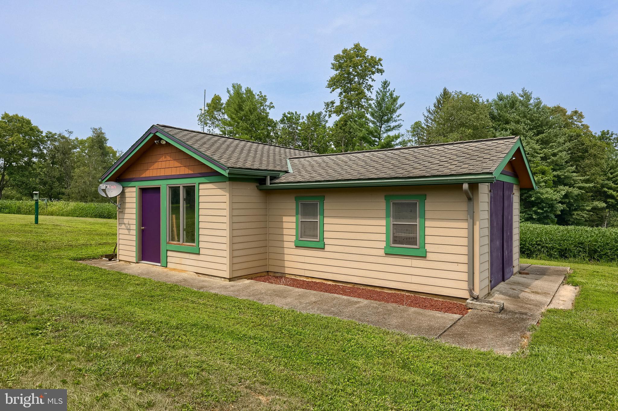 5776 Pheasant Run Road Hellam, PA 17406 - Photo 52 of 56 a front view of a house with garden