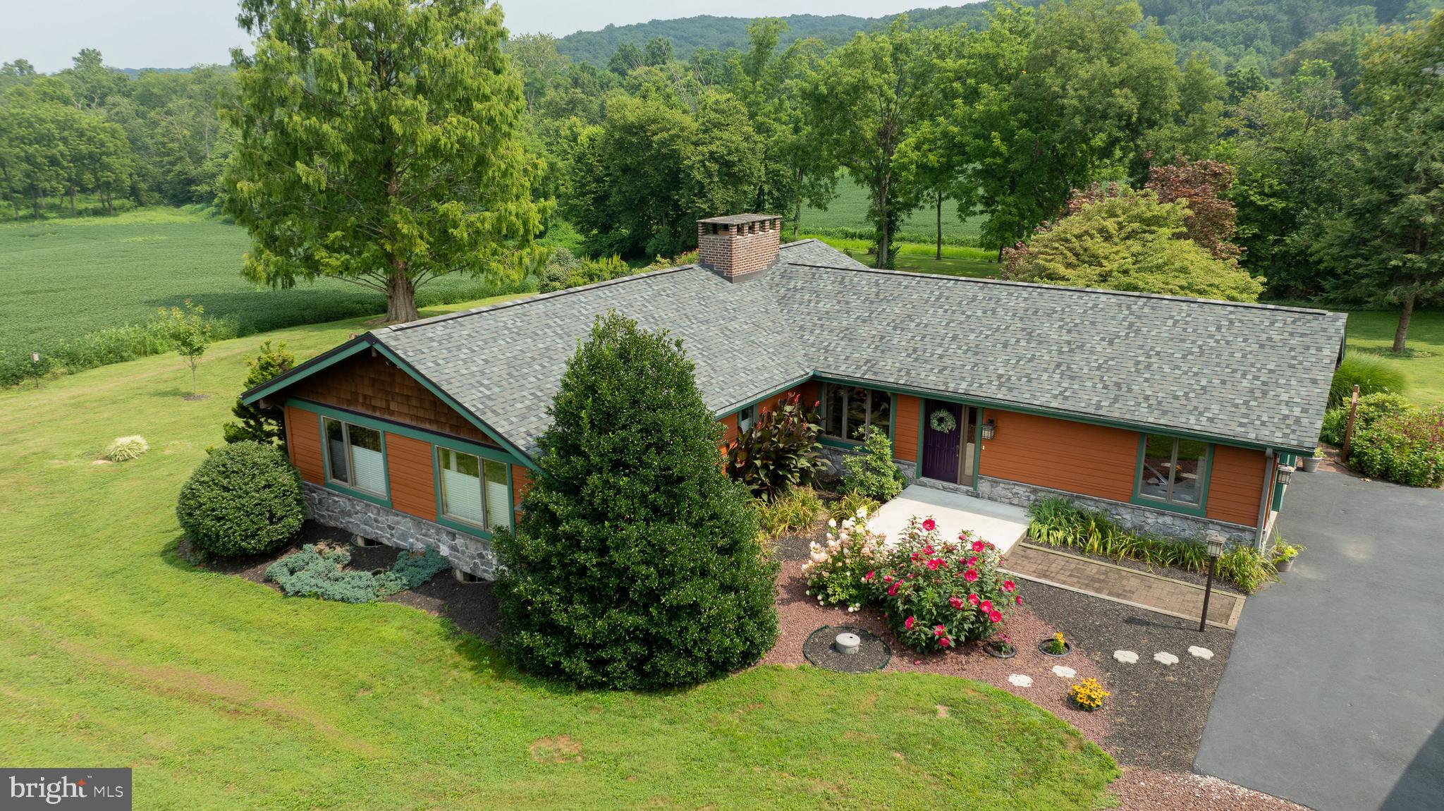 5776 Pheasant Run Road Hellam, PA 17406 - Photo 53 of 56 front view of a house with a yard