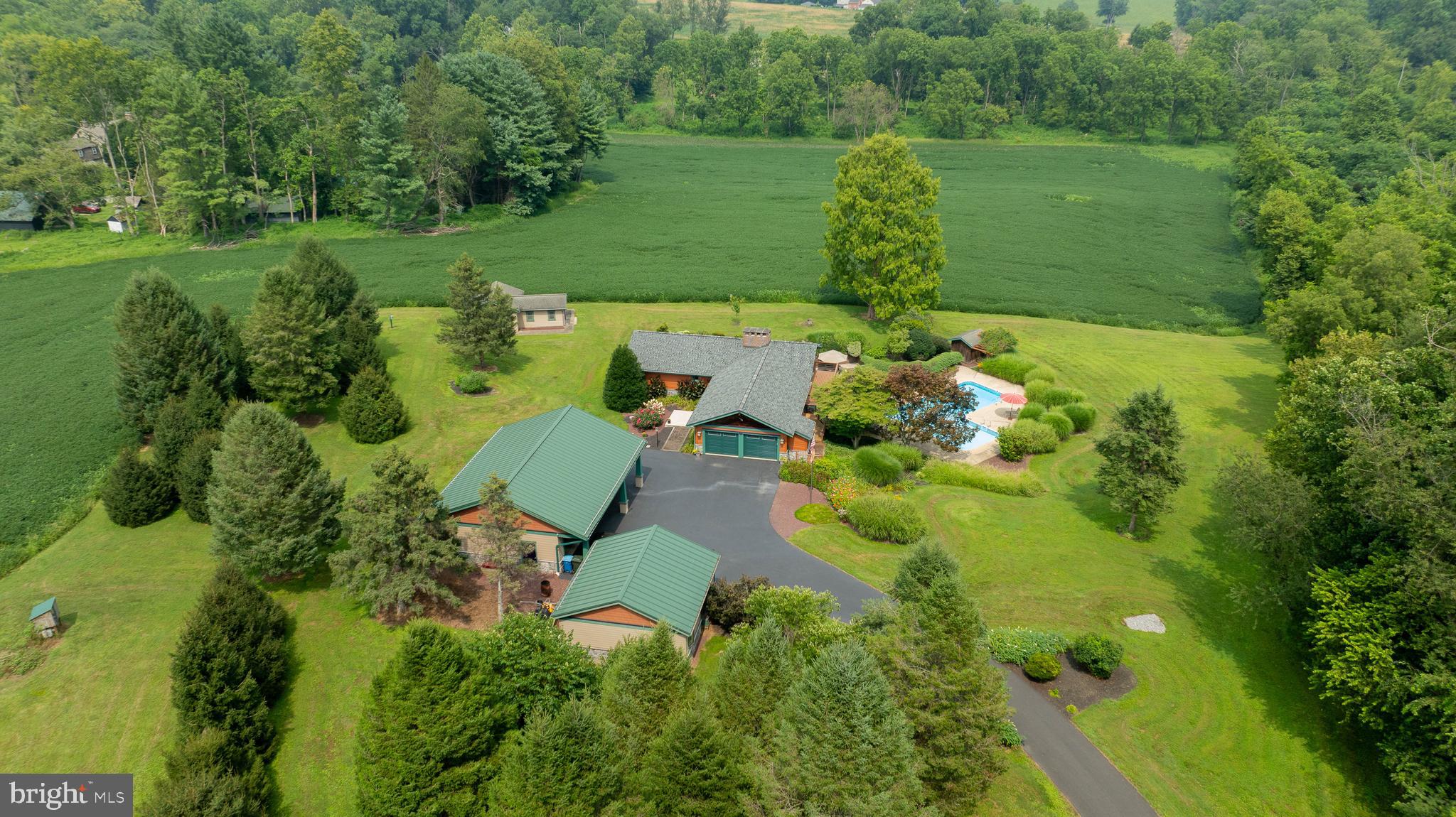 5776 Pheasant Run Road Hellam, PA 17406 - Photo 55 of 56 a view of a garden with a lake view