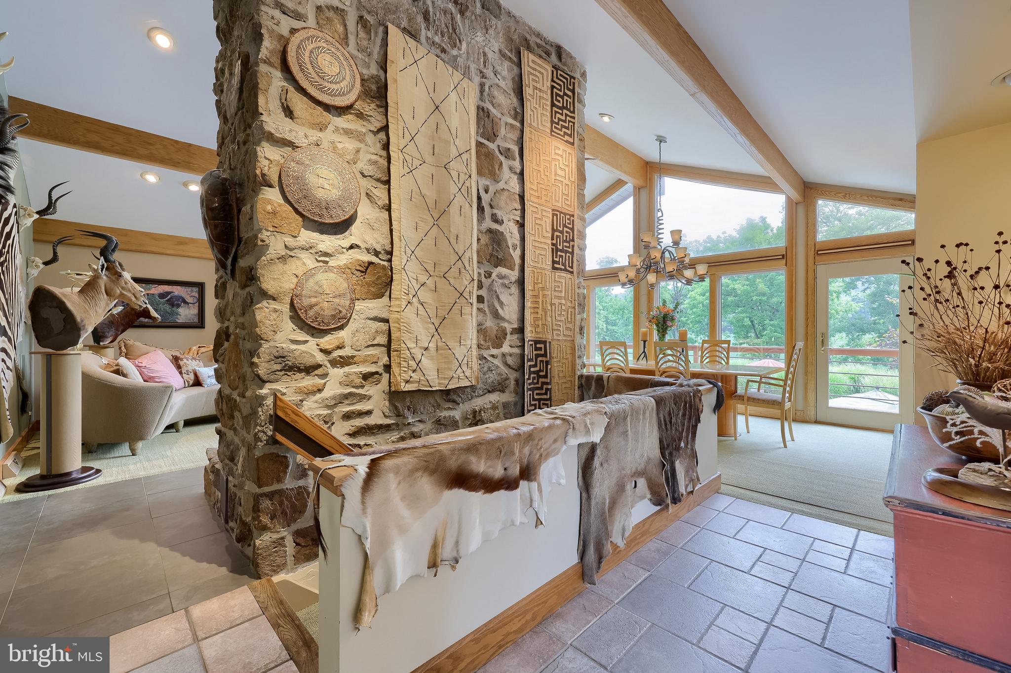 5776 Pheasant Run Road Hellam, PA 17406 - Photo 8 of 56 a living room with large windows