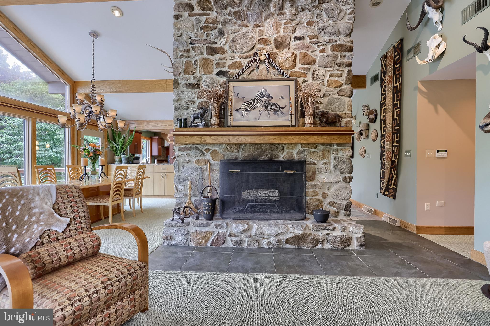 5776 Pheasant Run Road Hellam, PA 17406 - Photo 9 of 56 a living room with furniture and a fireplace