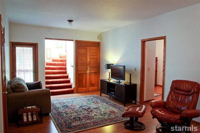 272 Chimney Rock Road Stateline, NV 89449 - Photo 16 of 35 a living room with furniture and a flat screen tv