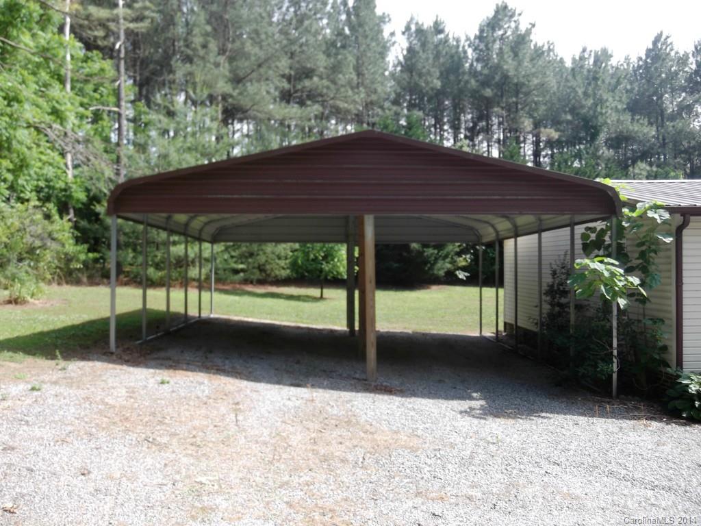 5664 Bill Sain Road Vale, NC 28168 - Photo 4 of 24 a view of a barn with a yard
