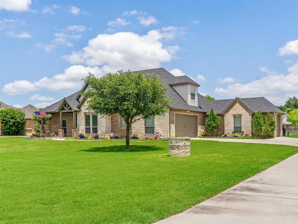 111 Old Base Road Aurora, TX 76078 - Photo 35 of 38 Beautifully updated custom home situated on a one-acre lot in Aurora Vista with mature landscaping, stone accents, and exceptional curb appeal.