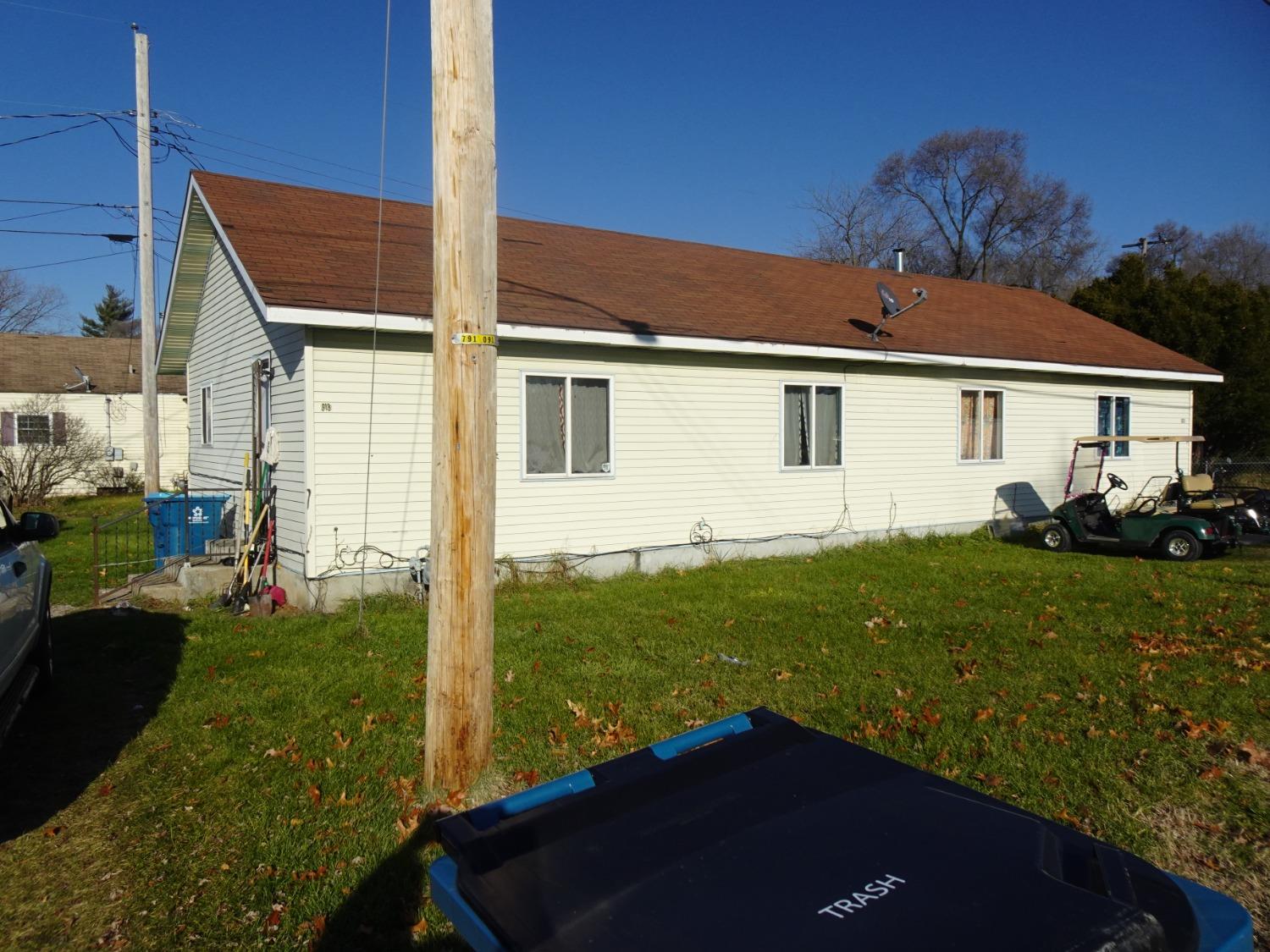 313 North Clark Street Knox, IN 46534 - Photo 12 of 13 a view of a backyard with plants