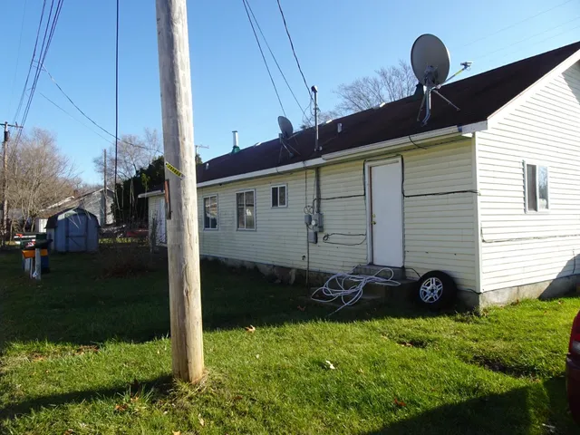 a view of a back yard of the house
