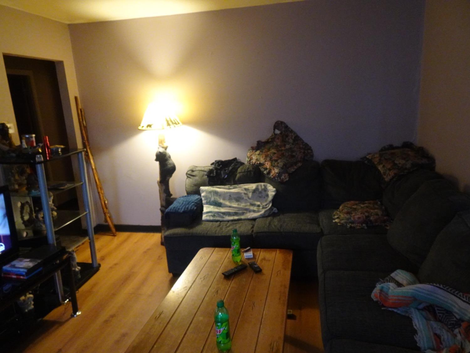 313 North Clark Street Knox, IN 46534 - Photo 3 of 13 a living room with furniture and a flat screen tv