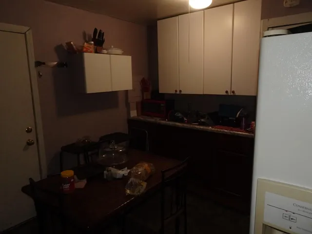 a close view of shoes and cabinets